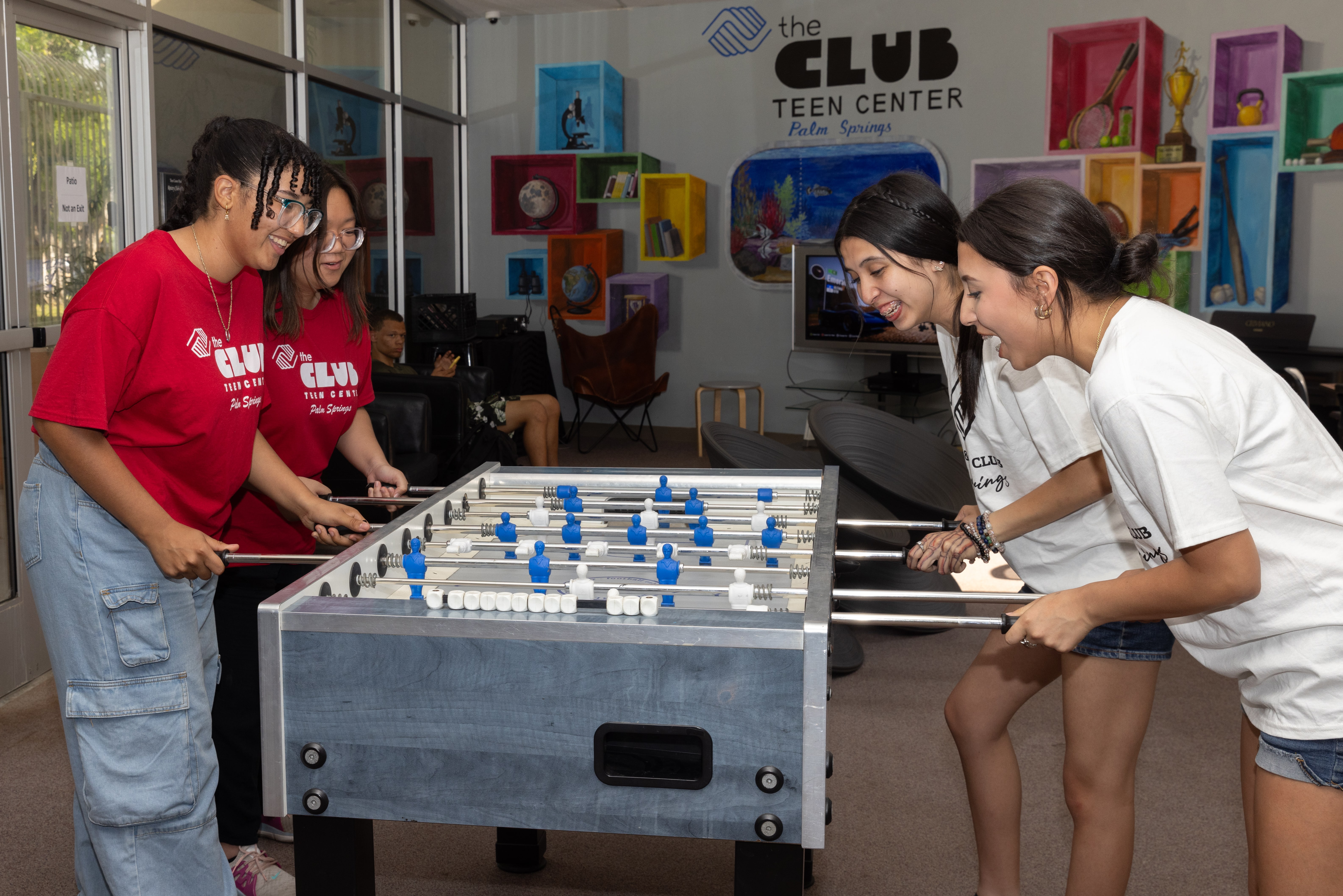 Teens Playing Foosball